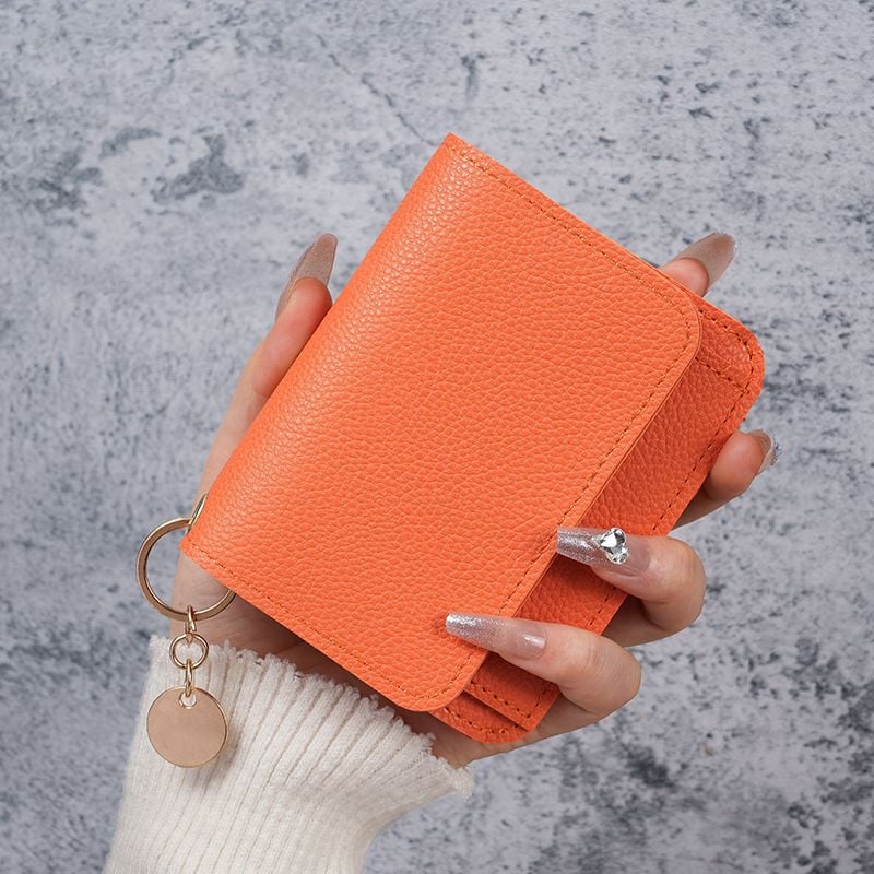 Elegant and Minimalist Women's Slim Short Wallet – A versatile, stylish mini tri-fold wallet featuring RFID protection, card slots, a bill compartment, and an ID window