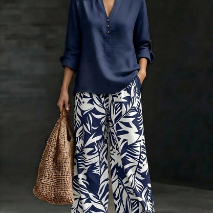 🔥Women's fashion casual two-piece set featuring a V-neck top with design details paired with wide-leg pants with a botanical pattern; comfortable and breathable, suitable for multiple occasions