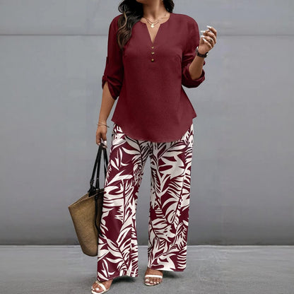 🔥Women's fashion casual two-piece set featuring a V-neck top with design details paired with wide-leg pants with a botanical pattern; comfortable and breathable, suitable for multiple occasions