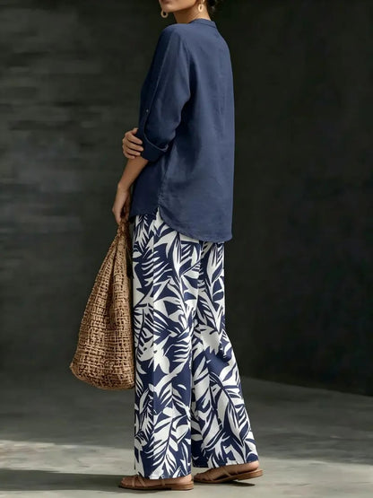 🔥Women's fashion casual two-piece set featuring a V-neck top with design details paired with wide-leg pants with a botanical pattern; comfortable and breathable, suitable for multiple occasions