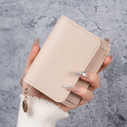 Elegant and Minimalist Women's Slim Short Wallet – A versatile, stylish mini tri-fold wallet featuring RFID protection, card slots, a bill compartment, and an ID window