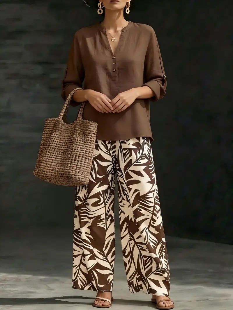 🔥Women's fashion casual two-piece set featuring a V-neck top with design details paired with wide-leg pants with a botanical pattern; comfortable and breathable, suitable for multiple occasions
