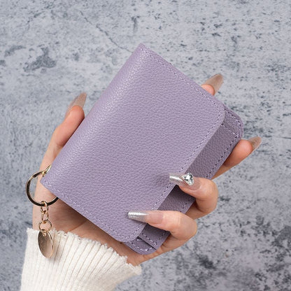 Elegant and Minimalist Women's Slim Short Wallet – A versatile, stylish mini tri-fold wallet featuring RFID protection, card slots, a bill compartment, and an ID window