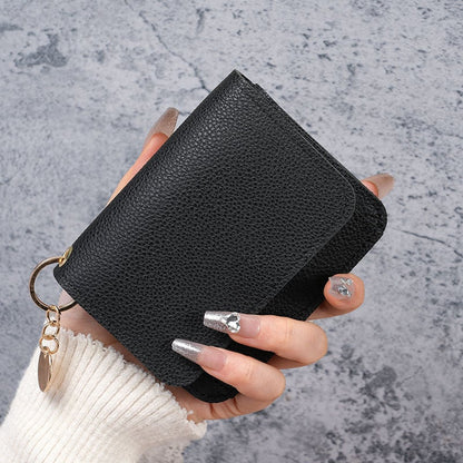Elegant and Minimalist Women's Slim Short Wallet – A versatile, stylish mini tri-fold wallet featuring RFID protection, card slots, a bill compartment, and an ID window