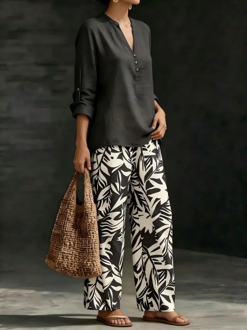🔥Women's fashion casual two-piece set featuring a V-neck top with design details paired with wide-leg pants with a botanical pattern; comfortable and breathable, suitable for multiple occasions
