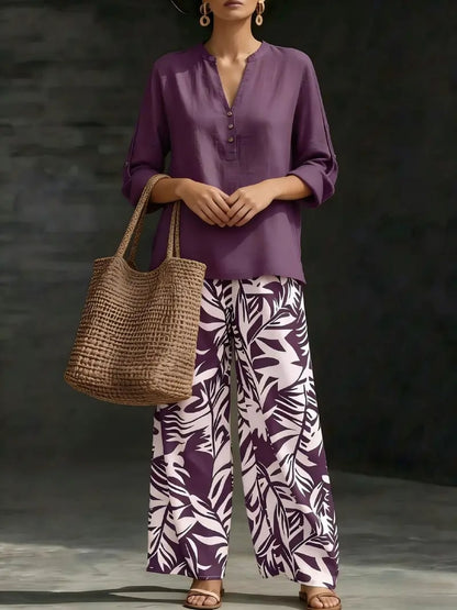 🔥Women's fashion casual two-piece set featuring a V-neck top with design details paired with wide-leg pants with a botanical pattern; comfortable and breathable, suitable for multiple occasions