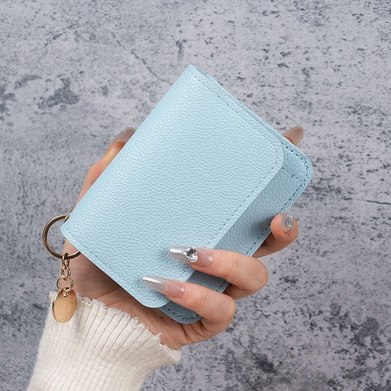 Elegant and Minimalist Women's Slim Short Wallet – A versatile, stylish mini tri-fold wallet featuring RFID protection, card slots, a bill compartment, and an ID window
