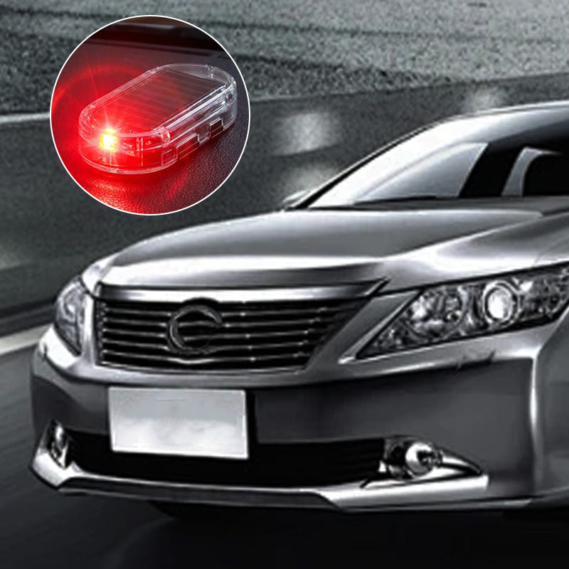 Car with flashing warning light visible inside