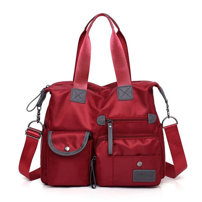 🥳2026 HOT SALE🥳💞50K+ SOLD!👜🌟 50% OFF! Large Waterproof Tote Bag – Spacious main compartment, multiple pockets & 3 carrying ways. Lightweight Oxford fabric – perfect for work, shopping & travel! 💪✨