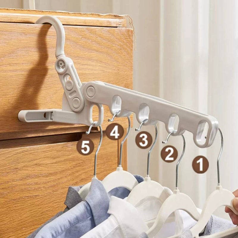 🥼Hang clothes anywhere you want！Portable Foldable Clothes Hanger